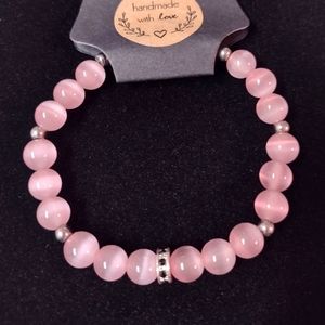 Pink Cats Eye bracelet with small Swarovski Crystal spacer bead.